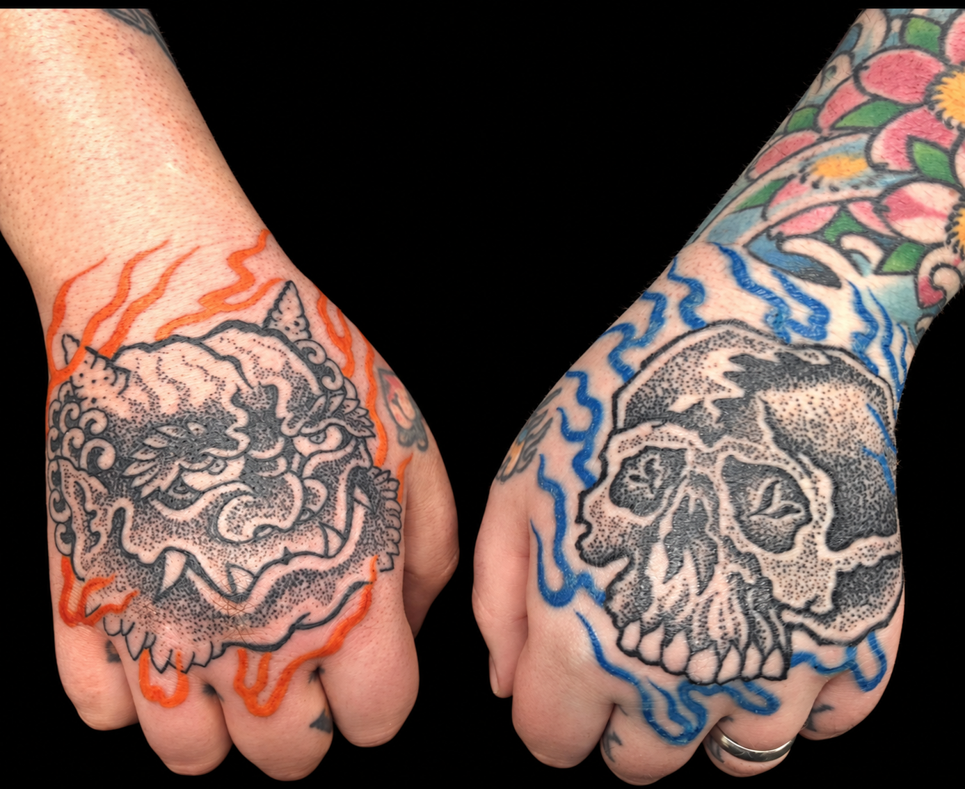 Paired oni and skull hand tattoos with orange and blue flames on a solid black background